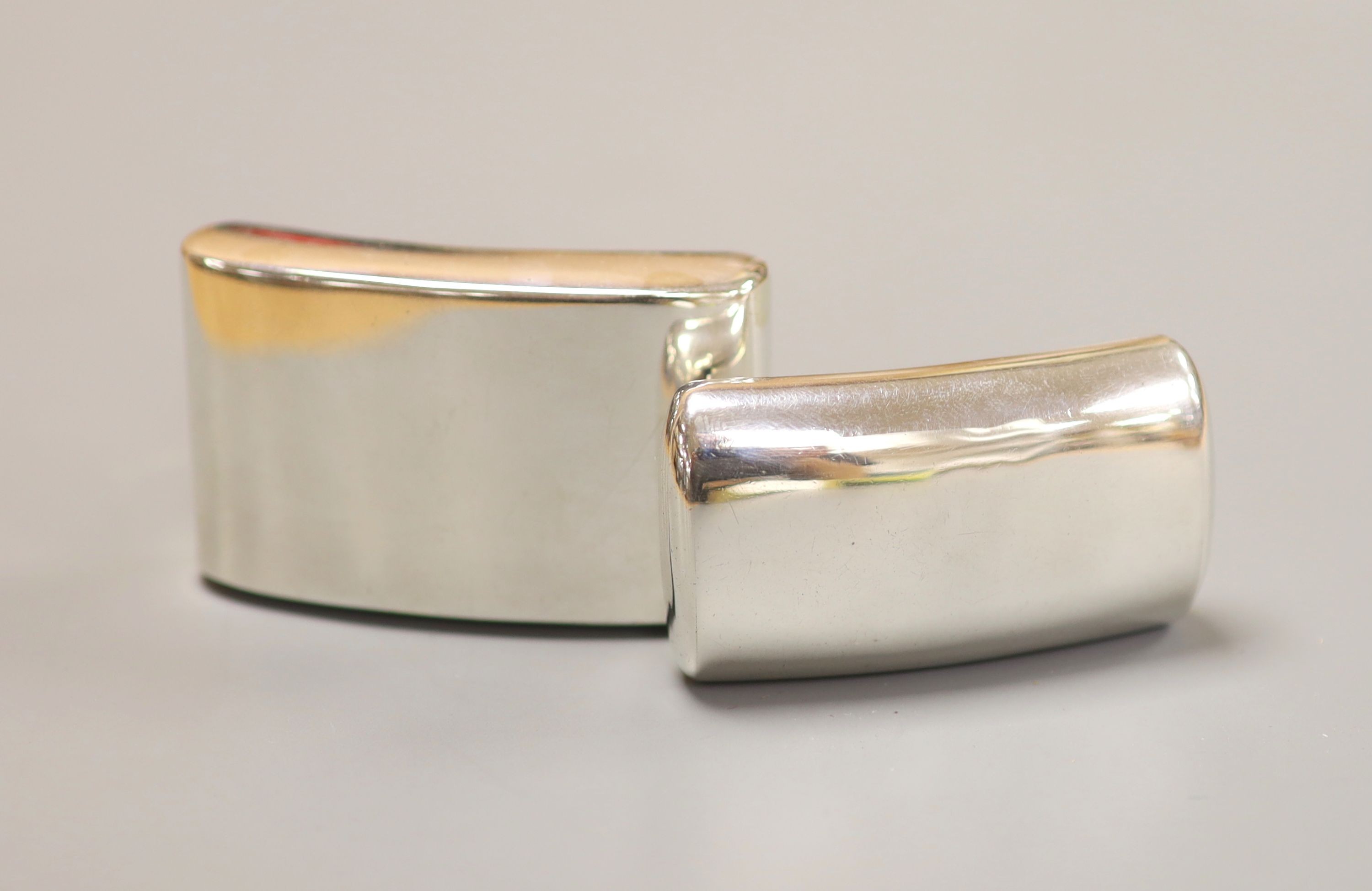 Two George III silver curved snuff boxes, largest Joseph Wilmore, Birmingham, 1809, 6cm and William Boot, Birmingham, 1809.